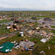 An aerial view shows damage to a neighborhood by Hurricane Laura outside of Lake Charles, Louisiana.